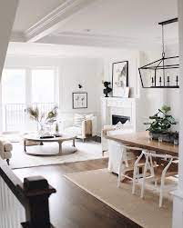 Don't think of white as absence, instead think of it as the perfect blank canvas for your favorite decor ideas. Family Room Living Room Dining Room Combo Farm House Living Room Living Dining Room