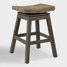 Other stools are made to stand out, like our brightly painted schoolhouse counter stools that add a playful pop of color to your decor. Rattan And Teak Leyla Swivel Counter Stool World Market