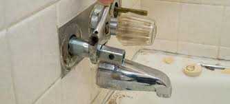 How to replace bathtub faucet handles. Remove A Fastened Tub Faucet Handle Doityourself Com