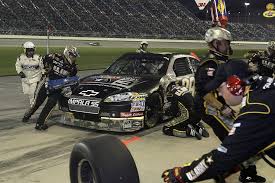 It depends on the length of the race, condition of the track as far as the type of paving, and also the number of cautions. Hd Wallpaper Pit Stop Pit Crew Nascar Tires Gasoline Auto Racing Speed Wallpaper Flare