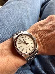 The oyster perpetual has a less busy look overall, its hour markers simple batons along with plain stick hands. Air King 40mm Vs Explorer 1 39mm Vs Oyster Perpetual 39mm Rolex Forums Rolex Watch Forum