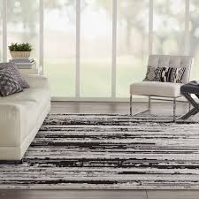 Spot cleaning after a minor spill. Zermatt Zer02 Ivory Charcoal Area Rug