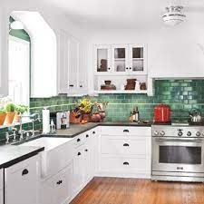 The Art Of The Seamless Addition Green Kitchen Backsplash Kitchen Remodel Vintage Modern Kitchen