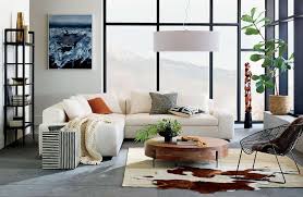 As you start browsing furniture, decorating and wall ideas for your room, think about the space's desired purpose and focus on a few staple items, such as a comfortable sofa and a coffee table, then choose the rest of the accent furniture and wall decor accordingly. Modern Living Room Ideas Cb2 Living Room Design Decor Modern Living Room Round Wood Coffee Table