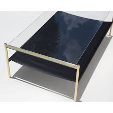 Frequently made of animal skin, leather and metal, all black leather coffee tables available were constructed with great care.there are 37 antique and vintage black leather coffee tables for sale at 1stdibs, while we also have 25 modern editions to choose from as well. Duotone Coffee Table Rectangular Brass Clear Glass Black Leather Rouse Home