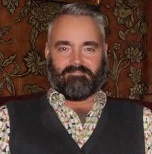 Church of England clergyman banned from taking services because he married  gay partner