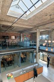 Skycatch Industrial Interior Of Renovated Penthouse For Drone Imaging Company Architecture Industrial Interiors Industrial Interior Design Penthouse