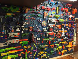 Watch this and i'll show you how to make your own peg board with real pegs! Behold 13 Clever Nerf Gun Storage Ideas Mum Central