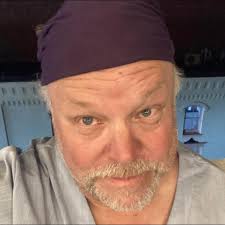 Francisca throwing axes in a medieval-themed location?