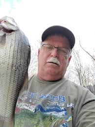 Catching a big blue fish in an Indiana river