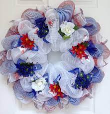 Sparkles everywheresupplies:14in wire framepipe cleanersglitter meshribbonsnowflake accentsjingle bellselmer's all purpose spray adhesive. Amazon Com Patriotic Floral Deco Mesh Wreath Shimmering Red White And Blue Handmade Handmade