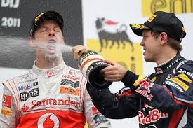 Race Winner Jenson Button Gbr Mclaren Mp4 26 Celebrates On The Podium With Sebastian Vettel Ger Red Hungarian Grand Prix Red Bull Racing World Championship