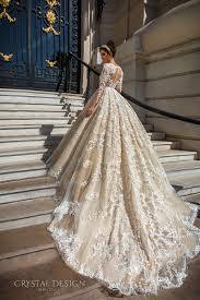 Sheath effortlessly stunning, this bridal style provides a tailored, narrow silhouette from neckline to hem. Crystal Design 2017 Wedding Dresses Haute Couture Bridal Collection Wedding Inspirasi Wedding Dresses Lace Ballgown Wedding Dress Long Sleeve Ball Dresses