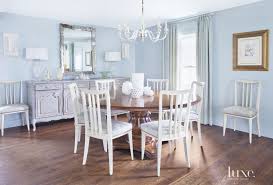 Elegant cozy room with bookstand. Traditional Blue Dining Room With Elegant Decor Luxe Interiors Design