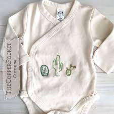 Whether you opt for a playful stripe jumpsuit, cozy hooded tassel knit sweater, or adorable animal ear hat, the baby clothes can be embroidered with the child's monogram or initials. 170 Embroidered Children S Clothing Ideas Embroidered Clothes Embroidered Onesie Embroidered