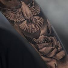 Forearm Bird And Rose Tattoo Dove Tattoo 25 Rose Tattoos For Men Dove Tattoos Tattoos For Guys