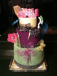 While the dessert doesn't have to be a surprise, it should delight the bride. Pin By Joanie Wanner On Wedding Baby Showers Dish Towel Cakes Towel Cakes Bridal Shower Kitchen Gifts