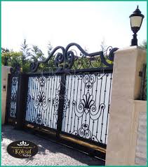 Garaj Kapilari Garaj Kapisi Modelleri Villa Garaj Kapilari Koksal Ferforje 0533 334 67 82 Wrought Iron Doors Iron Doors Iron Gates