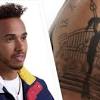 Racer lewis hamilton shows off his impressive body art, from the roses he loves to the compass that guides him.still haven't subscribed to gq on youtube? 1