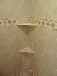 Our Own Ceramic Shower Wall And Floor Tile Border Detail And Shelves Of Travertine Tile Floor Bathroom Wall Tile Bathroom Floor Tile Patterns