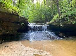 Highlights include rich vegetation, hiking alongside a creek for much of the the trail, a natural arch that actually spans the creek at the apex of the trail, a scenic waterfall, a small clearing for. A Beautiful Waterfall At Red River Gorge Adventure Mom
