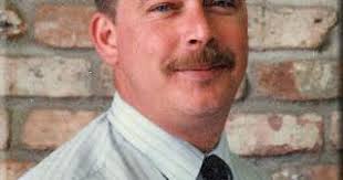 Michael "Mike" W. Peltier