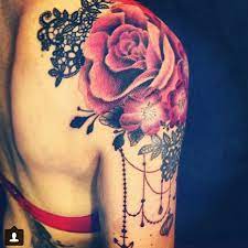 This tattoo design is a symbol of grace and beauty, and it's often incorporated into victorian designs. Rose Lace Tattoo Novocom Top