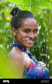 Portrait of a teenage girl enjoying shower Stock Photo - Alamy