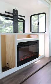 Installing a fireplace or wood stove costs about $2,299 it typically costs between $150 and $300 to install an electric fireplace. How To Install Tv Lift And Electric Fireplace In Rv Mountainmodernlife Com
