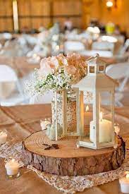 30 Extraordinary Rustic Wedding Centerpieces With Lanterns Design Ideas Oosile Wedding Table Rustic Wedding Centerpieces Wedding Table Centerpieces