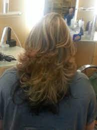 Short Layered Haircut With Multiple High And Low Lights Curls For Long Hair Short Layered Haircuts Long Wavy Haircuts