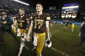 Wyoming Quarterback Josh Allen Walks Off The Field Following The Team S 24 21 Loss To Byu In The Poinsettia Bowl Ncaa Colle Nfl Draft Ncaa College Football Nfl