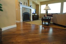 White Fireplace Surround With Smaller Tile And Black Around Opening Shamrock 4 Walnut Livi Living Room Hardwood Floors Wood Floor Colors Walnut Living Room