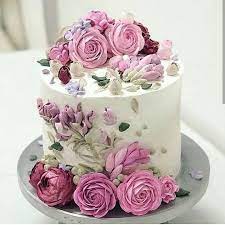 One of my favorite cake decorating techniques i learned over the last year is how to to use icing spatulas and piping tips to create floral print patterns on buttercream cakes. Pin By Marianne Fasulo On Lovely Cakes Floral Cake Birthday Cake With Flowers Flower Cake