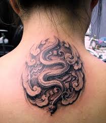 Scary snake tattoose on the leg. 45 Awesome Snake Tattoos On Back