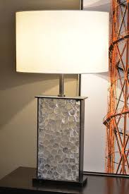 Our driftwood lamps are all wonderfully individual in their natural sea washed and weather worn appearance, whilst our lovely range of original pebble lamps beautifully conjure up the coastline. Pebble Atelier Stefan Leo