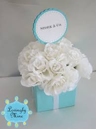 Will update the stars in future once it flowers and i can see if it really is the blue dahlia. Tiffany Blue Square Vase White Flowers With A Touch Of Pink This Is A Silk Centerpie Tiffany Baby Shower Theme Tiffany Baby Showers Tiffany Blue Baby Shower