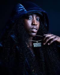 Flau'Jae Johnson is a phenomenal rapper and basketball star. She's 18, and  just getting started. Her father, Camoflauge, was an up-and-coming rapper  prodigy himself whose life was cut short by gun violence