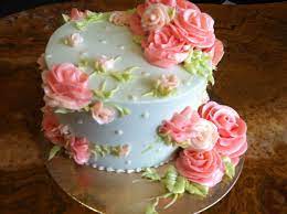 Make centers with white fondant balls covered in blue sugar and stick them in the middle. Light Blue And Pink Buttercream Flower Cake Cake Decorating Cake Pretty Cakes
