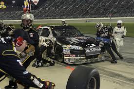 How much gas is used in a 500 mile nascar race? Pit Stop Pit Crew Nascar Tires Gasoline Auto Racing Car Speed Racetrack Sport Fast Pikist