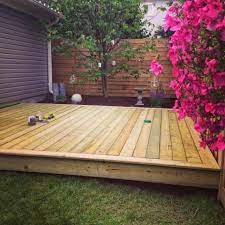White Wood Our New Outdoor Room And Platform Deck Platform Deck Small Backyard Decks Outdoor Wood Decking