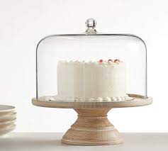 This wooden cake stand in white is especially suited to dress up a shabby chic event. Pottery Barn Farmhouse Wood White Wash Cake Dome Cake Dome Wooden Cake Stands Wood Cake Stand