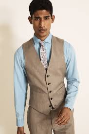 It has a two button fastening, two outer pockets, a ticket pocket and an outer breast welt. Moss 1851 Tailored Fit Stone Brushed Twill Supreme Stretch Waistcoat By Moss Bros Thread Com