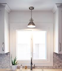 This kitchen seems not to be expected here, that's why it's so classy! Ideas For Small Kitchen Lighting 1stoplighting