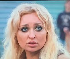 Jen She even does that creepy look when she lowers her eyes. She's just so  gd weird.