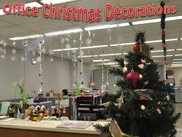 In fact, if your office has expansive hallways or more than one reception area, you can play up this architectural feature by decorating similar trees throughout. Office Christmas Decorations