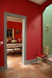 It is not just a big open area in your two bedroom domicile filled with couches and a tv. Designers 12 Favorite Shades Of Red Paint And A Gift Red Interior Design Red Paint Colors Red Wall Paint