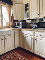 For the cabinet doors, i recommend painting the backs first so the fronts come last and aren't sitting against your work surface. Farmhouse Painted Kitchen Cabinet Makeover The Little By Little Home