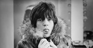 Bounty hunters from the future transport a doomed race car driver to new york city in 2009, where his mind will be replaced with that of a dead billionaire. Mick Jagger The Talks