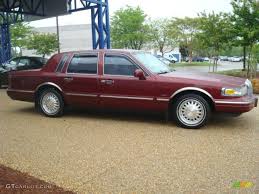 Image result for Toreador Red 1999 Town Car